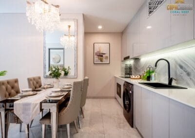 Elegant dining area with modern kitchen and stylish decor at SIAMIQ, Thailand.
