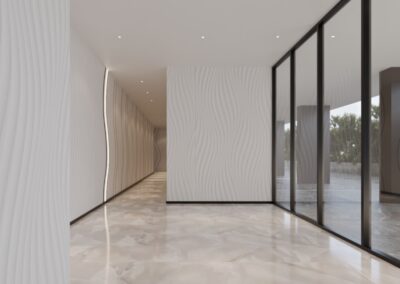 Elegant modern interior with marble flooring and large glass windows at SIAMIQ, Thailand.