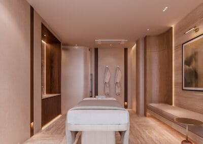Relaxačná miestnosť v holistickom spa s masážnym stolom a moderným dizajnom.
