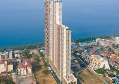 Luxusný hotel SIAMIQ pri mori v Thajsku, moderná výšková budova, výhľad na oceán.