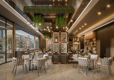 Modern hotel lobby with stylish seating and greenery decor.
