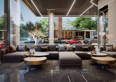 Modern hotel lobby with comfortable sofas and large glass windows.