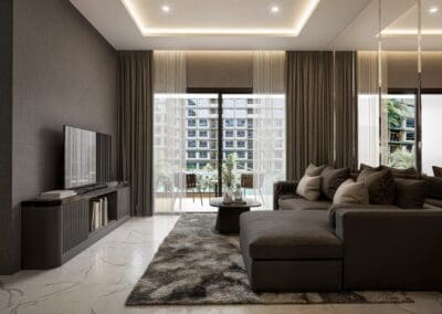 Modern living room with large windows, gray sofa, and TV in a luxury apartment.