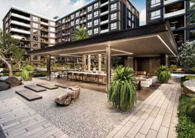 Modern outdoor lounge area with bar and seating in SIAMIQ, Thajsko.