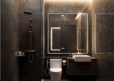 Modern minimalist bathroom with black marble walls and LED mirror lighting.